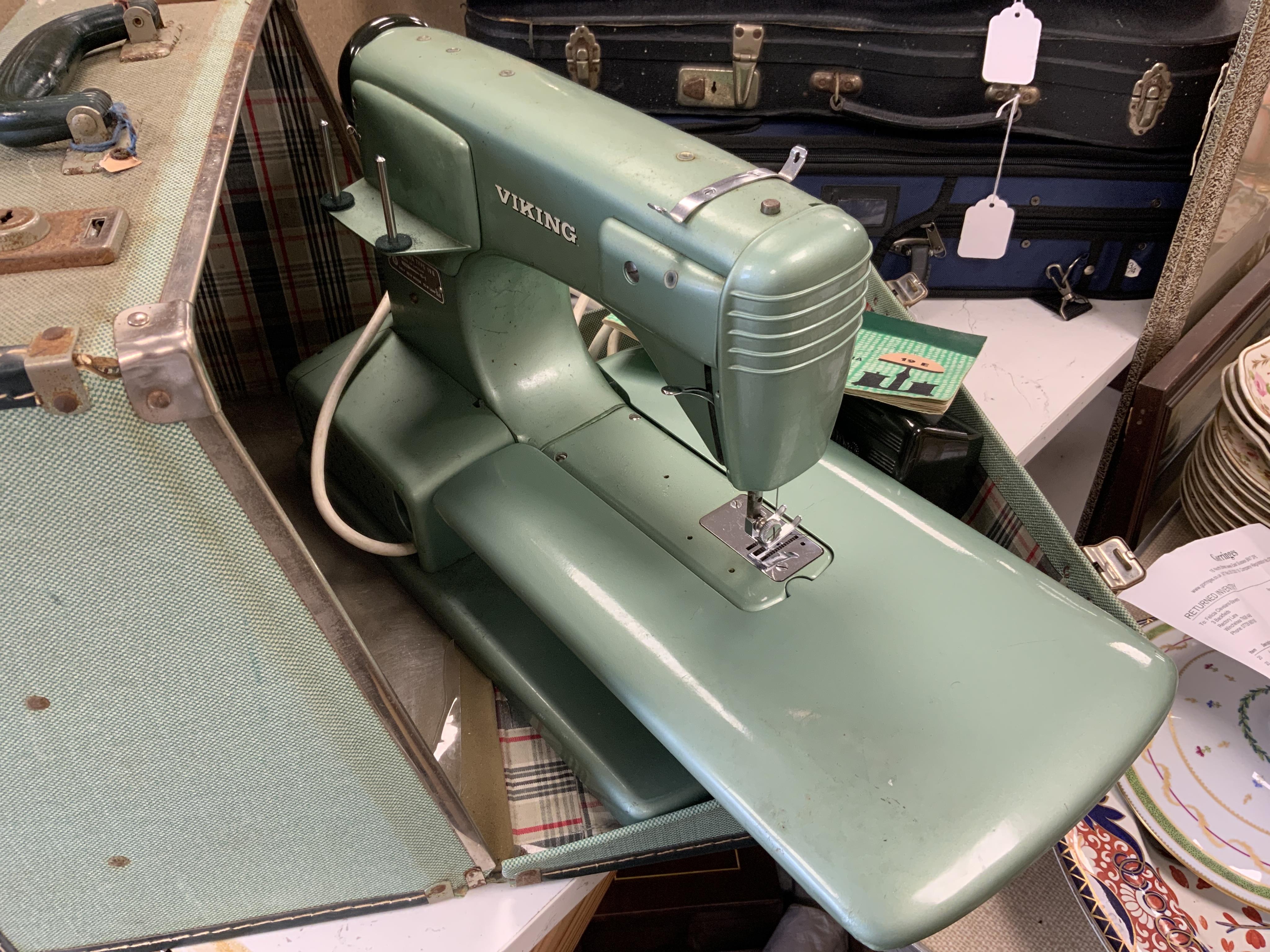 A Swedish 1950s/60s Viking Husqvarna Zig-Zag electric sewing machine, in original fitted case with instruction manual. Condition - fair to good.